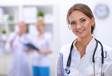 Woman doctor standingat hospitalの写真素材