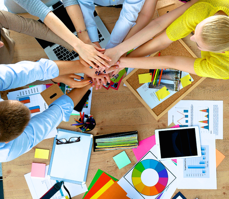 Business team with hands together - teamwork conceptsの写真素材
