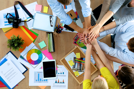 Business team with hands together - teamwork conceptsの写真素材