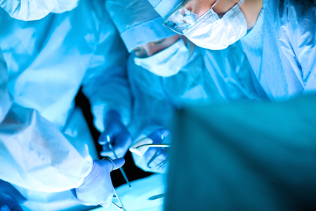 Surgery team in the operating room .の写真素材