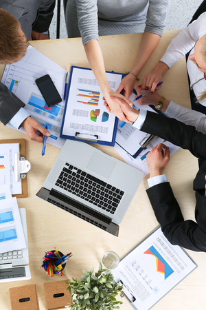 Business people handshake, sitting at the table .の写真素材