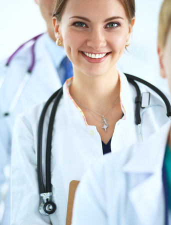 Attractive female doctor in front of medical group .の写真素材