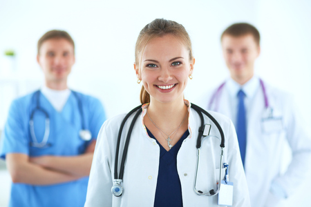 Attractive female doctor in front of medical group .の写真素材