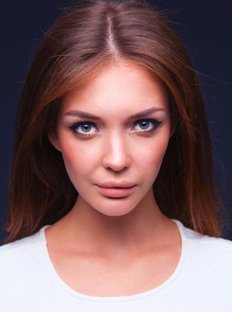 Portrait of a beautiful woman , isolated on black background .の写真素材