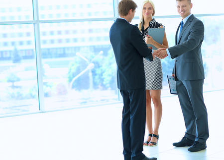 Business people shaking hands after meeting .の写真素材
