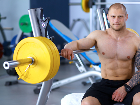 Young handsome man after workout in the gym .の写真素材