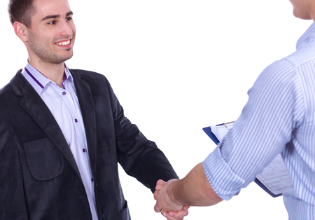 Businessmen shaking hands, isolated on white. Closeupの写真素材