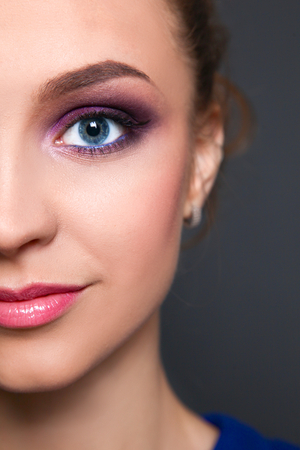 Studio shot of a beautiful young woman wearing professional makeup.の写真素材