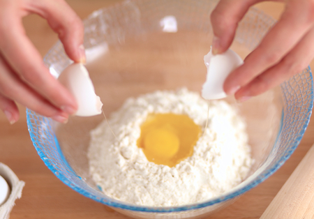 woman in the kitchen, isolated on backgroundの写真素材