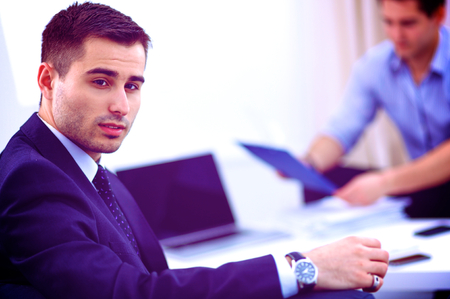 Business people talking on meeting at office, sitting at the deskの写真素材