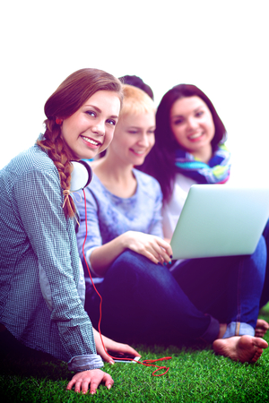 Group of young student using laptop together .の写真素材