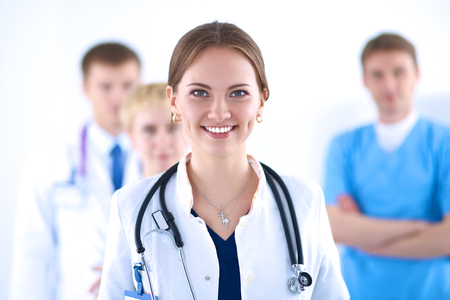 Attractive female doctor in front of medical group .の写真素材