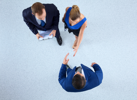 Business people shaking hands - topview .の写真素材