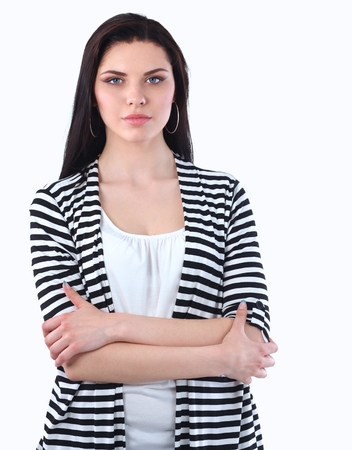 Beautiful casual young woman standing isolated against white backgroundの写真素材