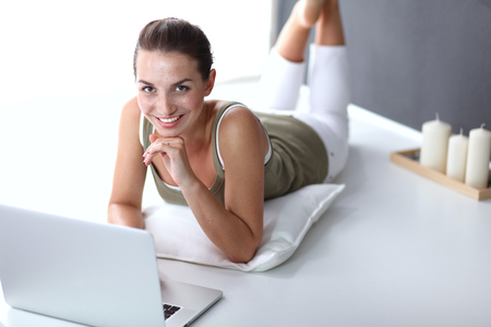 Attractive caucasian girl lying on floor .の写真素材