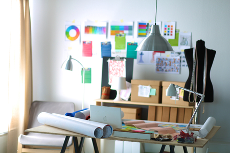 Designer work place with sew manikins, in officeの写真素材