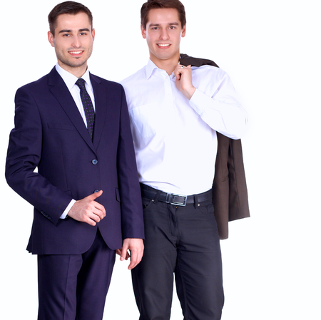 Two business men standing  isolated on white background.の写真素材