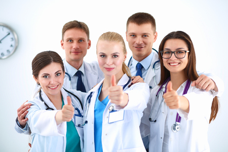 Portrait of doctors team showing thumbs up .の写真素材