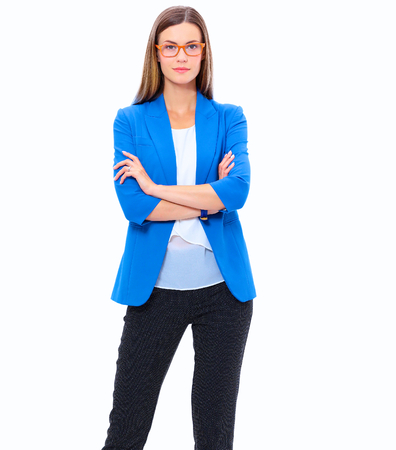 Portrait of a confident young woman standing isolated on white backgroundの写真素材