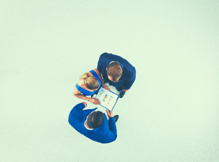 Business people standing with folder together - topviewの写真素材