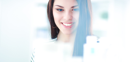 Beautiful young woman in shopの写真素材