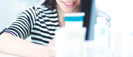 Beautiful young woman in shopの写真素材