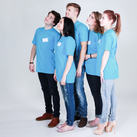 Group of happy students. Isolated over white backgroundの写真素材