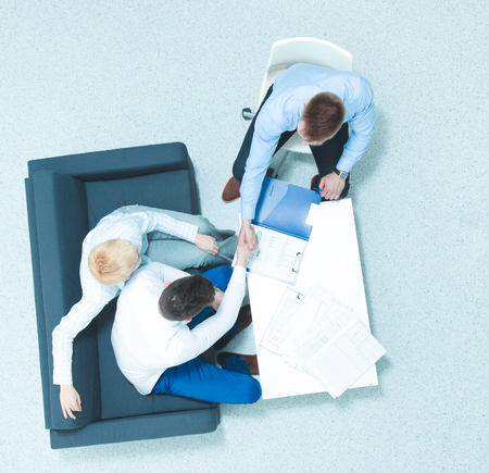 Business people shaking hands - topview .の写真素材