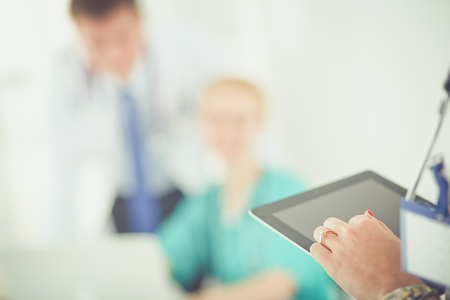 Woman doctor standing with stethoscope at hospital . Woman doctorの写真素材
