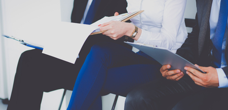 Group of business people sitting on chair in office .の写真素材