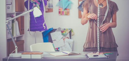 Young fashion designer working at studio.の写真素材