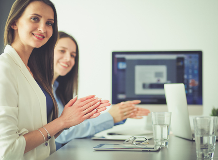 Photo of partners clapping hands after business seminar. Professional education, work meeting, presentationの写真素材