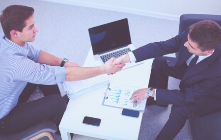 Businessmen shaking handsの写真素材