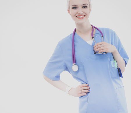 Portrait of female doctor standing against isolated on white background. Woman doctor.の写真素材