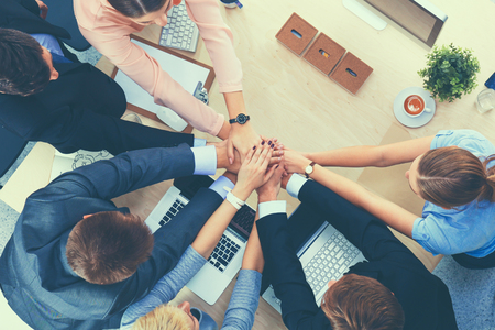 Business team with hands together - teamwork conceptsの写真素材