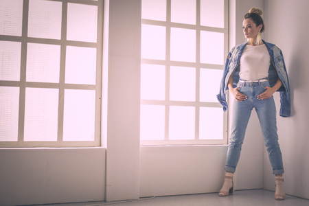 Beautiful woman standing in study. Beautiful woman.の写真素材