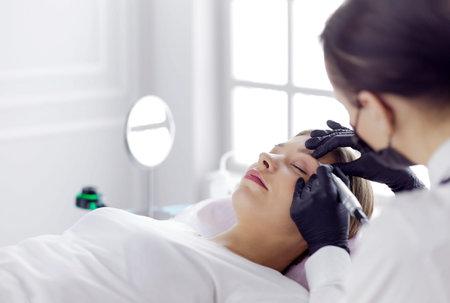 Microblading eyebrows work flow in a beauty salon.