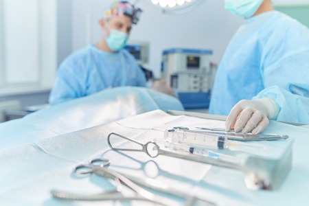 Team surgeon at work in operating roomの写真素材
