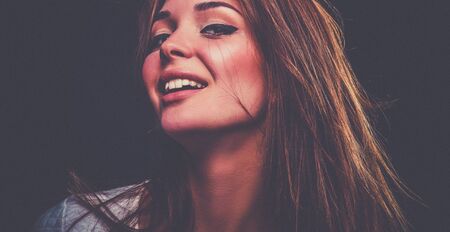 Portrait of a beautiful woman , isolated on black background. Portrait of a beautiful womanの写真素材