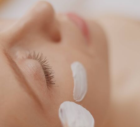 Spa facial mask application. Spa beauty organic facial mask application at day spa salonの写真素材