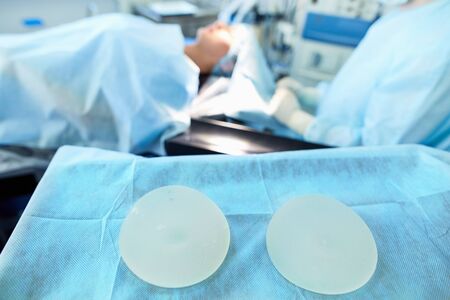 Man surgeon at work in operating room.の写真素材