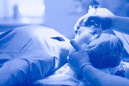 Man surgeon at work in operating room