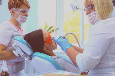Healthy teeth patient at dentist office dental caries prevention.の写真素材