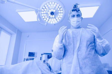 Male surgeon on background in operation room