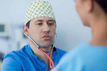 Man surgeon at work in operating room