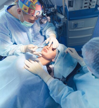 Team surgeon at work in operating room.の写真素材
