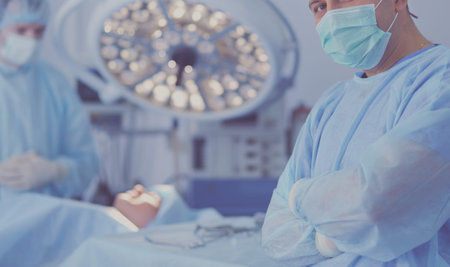 Male surgeon on background in operation room
