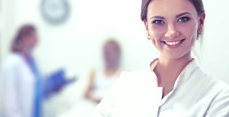 Woman doctor standingat hospitalの写真素材