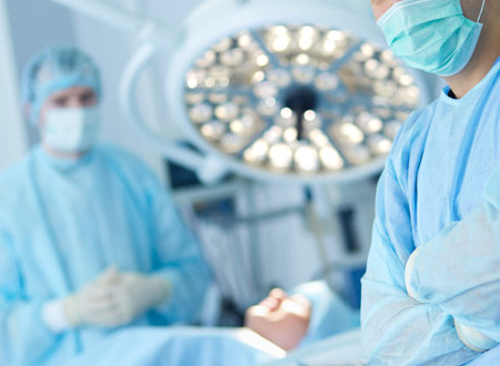 Male surgeon on background in operation room.
