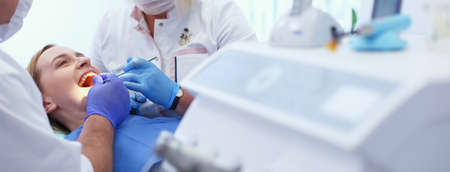 Doctor and patient in the dental clinicの写真素材